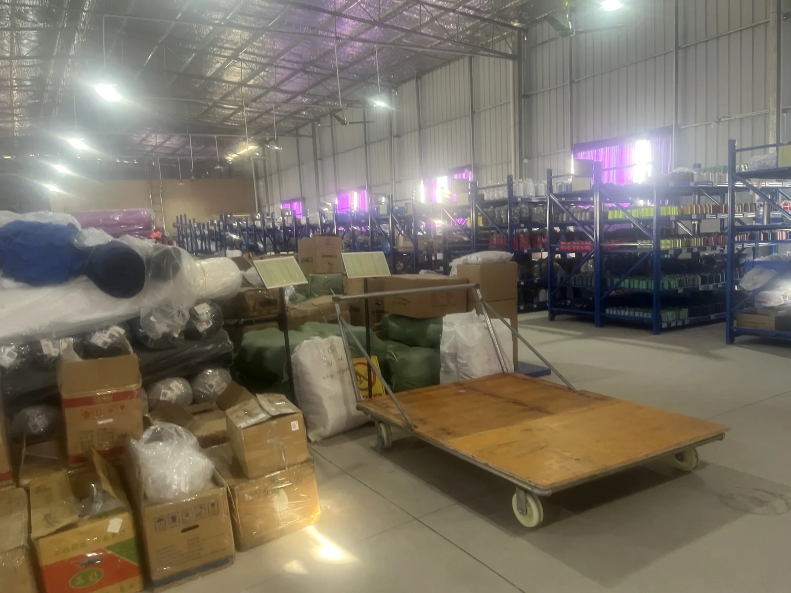 Fabric rolls and material storage area for sportswear production orders