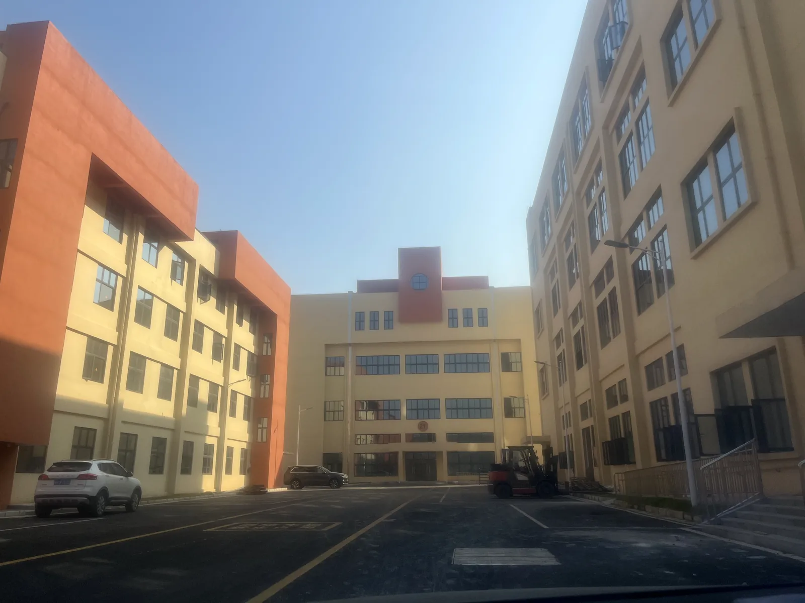 Exterior view of the JGKIT sportswear factory building used for custom teamwear production