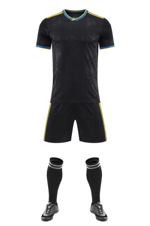 Black blank soccer kit with yellow piping and matching shorts, front and back